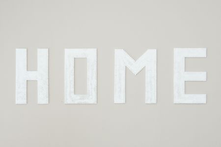 The word home at the wall in houseの写真素材