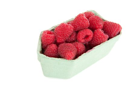 Blackberries in green carton isolated over white