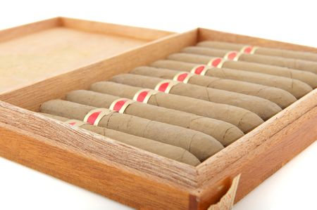 Full cigar box from wood isolated over whiteの写真素材