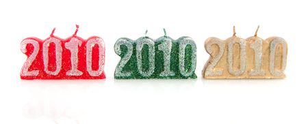 New year 2010 with a row of colorful candlesの写真素材