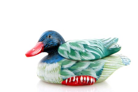 Wooden colorful water duck with white backgroundの写真素材