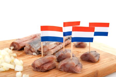 Dutch traditional raw fish herring with onionsの写真素材