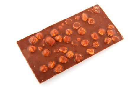 Chocolate bar with hazelnuts isolated over white