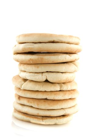 A pile of flat bread isolated over whiteの写真素材