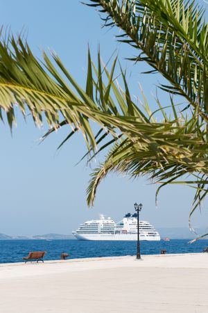 Big cruise boat at the Greek Peloponnese coastの写真素材