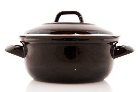 Black kitchen meat pan isolated over whiteの写真素材