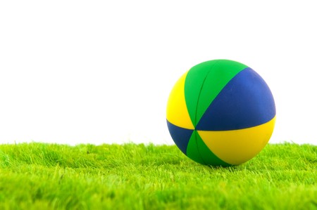 Colorful toy ball in the green grassの写真素材