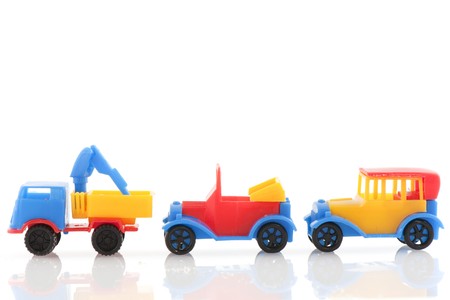 Colorful plastic cars in blue red and yellow