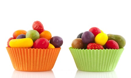 colorful candy in fruit shape with orange and green cup cake papers