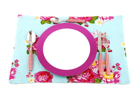 colorful plate with checkered cutlery on roses