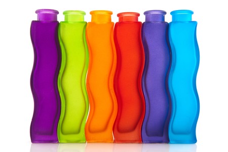 Modern colorful glass vases isolated over whiteの写真素材