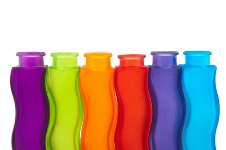 Modern colorful glass vases isolated over whiteの写真素材