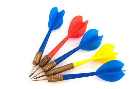 Colorful darts arrows for the goal isolated over whiteの写真素材