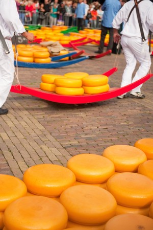 Many whole Dutch cheese at the market in Alkmaarの写真素材