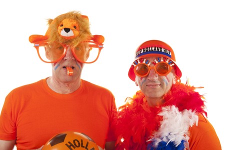 Dutch soccer supporters in orange on white backgroundの写真素材