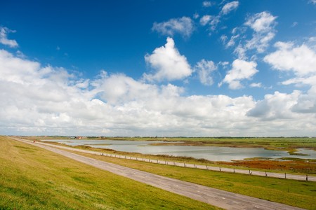 Dutch landscape behind the dike in North Hollandの写真素材