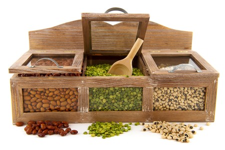 Various dried legumes in wooden shop shelfs の写真素材