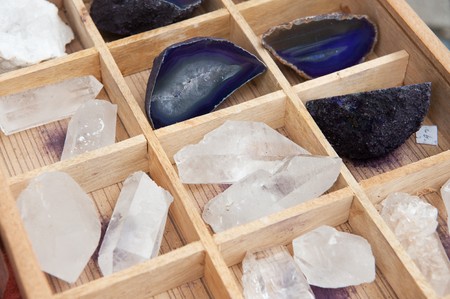 quartz stones in white and blue in wooden box