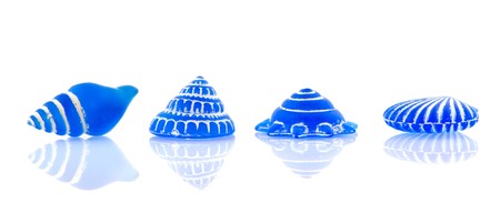 Several blue glass shells isolated over whiteの写真素材