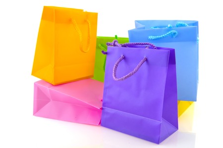 Colorful empty shopping bags isolated over whiteの写真素材