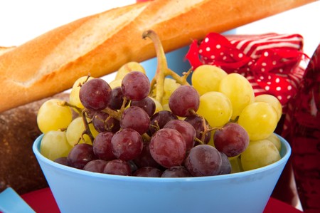 Colorful picnic food with bread and fruitの写真素材