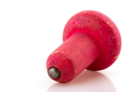 Old green spinning top isolated over whiteの写真素材