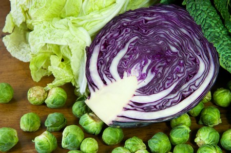 Still life with assortment cabbages on wooden tableの写真素材