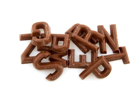 Traditional chocolate letters for Sinterklaas holidays isolated over whiteの写真素材