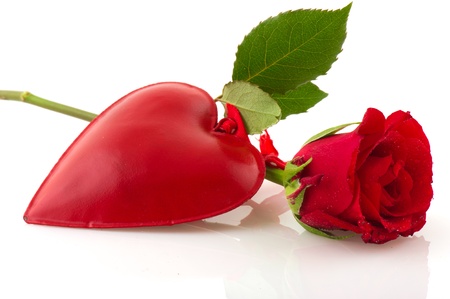 Red rose with heart for love isolated over whiteの写真素材