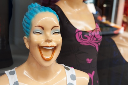 Funny showcase doll in the shop window の写真素材