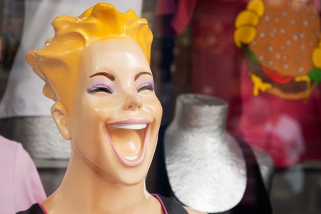 Funny showcase doll in the shop window の写真素材
