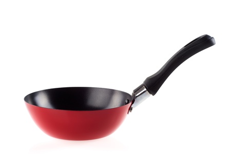 Red frying pan isolated on white backgroundの写真素材