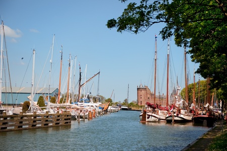 Village Muiden in Holland with recreation harbor and castleの写真素材