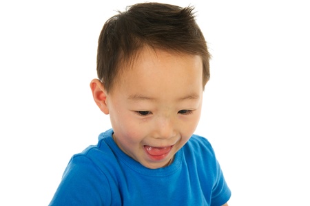 Portrait of a Chinese boy with lots of fun isolated over white