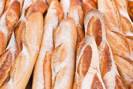 many fresh baked French baguettes in Franceの写真素材