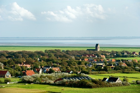 Typical Dutch village Hollum at the wadden island in Hollandの写真素材