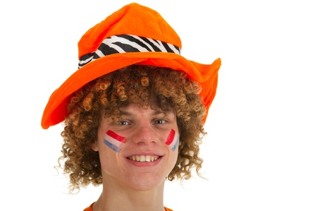 Young boy is supporting the Dutch teamの写真素材