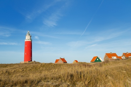 Red lighthouse at the Dutch island Texelの写真素材