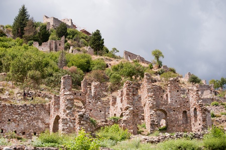 Spooky old and damaged ruin with dark clouds の写真素材