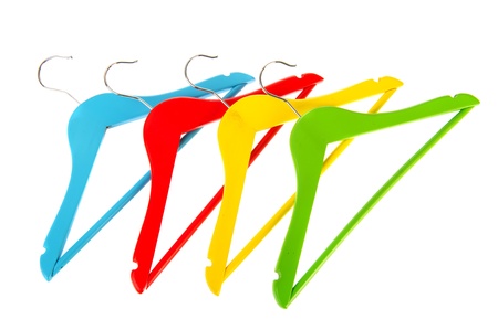 Colorful coat-hanges in red blue green and yellowの写真素材