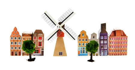 Typical Dutch village with windmill isolated over white backgroundの写真素材