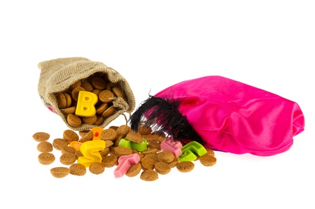 Dutch Sinterklaas pepernoten and marzipan letters with hat of Black Pietの写真素材