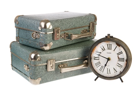 Old times with vintage suitcases and clock