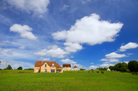 New build houses on a green hillのeditorial素材