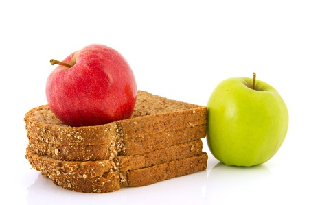 Slices of bread and fresh apples for dietの写真素材