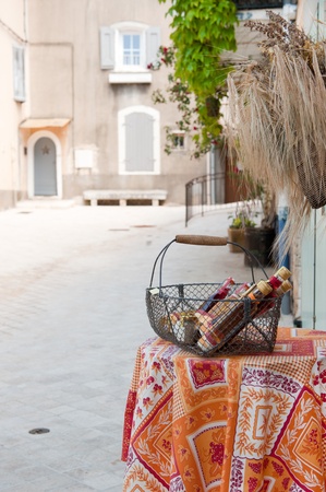 Shop for regional products with bottles on a table outdoorのeditorial素材
