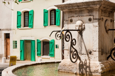 Typical French square with water fountainの写真素材