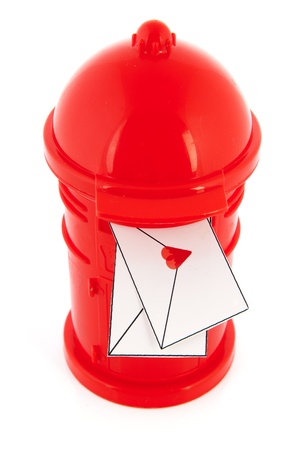 Love mail letters in red post box isolated over white backgroundの写真素材
