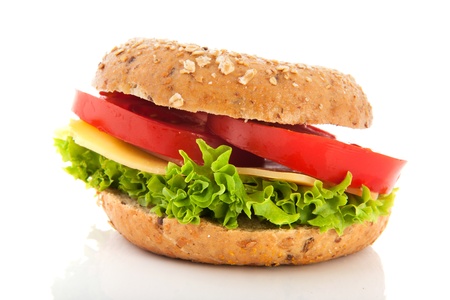 Fresh bagel with cheese and vegetables