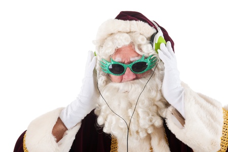 Portrait of Santa Claus listening to cool musicの写真素材